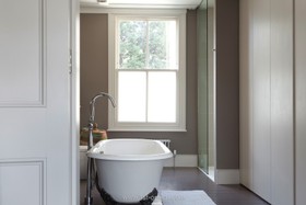 Archway - bath -  roll top,bathroom,floor - dark,floor - wooden