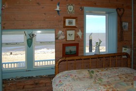 The Battery - bedroom,wood panneling