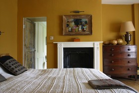 Brixton House - bedroom,bright colours,period,fireplace,antique furniture