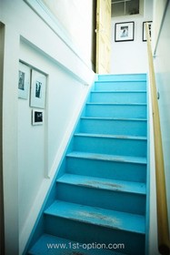 Broadhurst Gardens - bright colours,floor - wooden,staircase