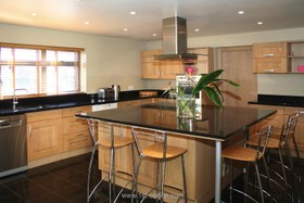 Etchingham Park - floor - tiled,kitchen,kitchen island,floor - dark,modern