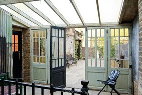 The House - conservatory,exposed brick