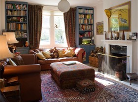 The Oval - living room,floor - carpet,dark colours,fireplace,floor - dark,period
