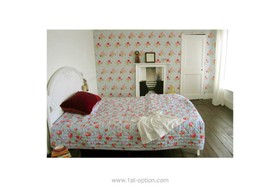 Rose Villa - bedroom,wallpaper,antique bed,bright colours,fireplace,floor - dark,floor - wooden