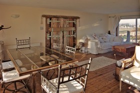 Seascape - beach,dining room,floor - light,floor - wooden