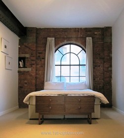 Spratts Factory - bedroom,exposed brick,floor - carpet,floor - light,modern