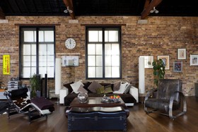 The Stables - exposed brick,floor - dark,floor - wooden,living room,modern