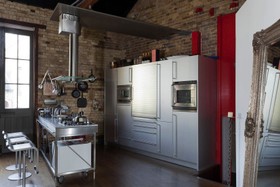 The Stables - exposed brick,floor - dark,floor - wooden,kitchen island,kitchen,metallic