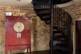The Stables - exposed brick,floor - dark,floor - wooden,staircase - spiral