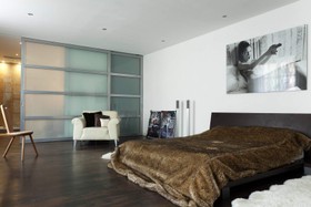The Stables - bedroom,floor - dark,floor - wooden,modern
