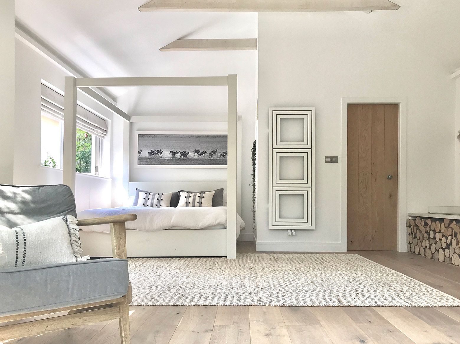 Neutral colours and a four poster bed