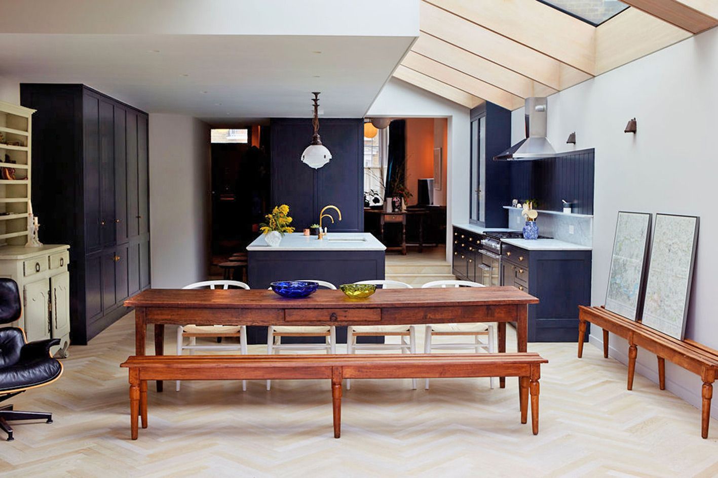 Light parquet flooring is featured throughout the ground floor