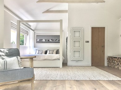 Neutral colours and a four poster bed
