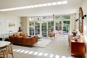 Feasts - modern kitchen island tiled floor games room exposed brick library bathtub - thumbnail
