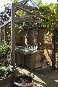 Flagstone - antique furniture wooden shutters breakfast bar wooden beams classic understated attic patio pergola fireplace - thumbnail
