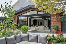 Hyde - roll top bath breakfast bar kitchen island skylight patio landscaped garden sliding doors modern renovated porcelain tile - thumbnail