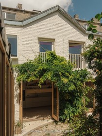 The Old Dairy - exposed brick wood paneling courtyard cobblestone french doors industrial modern gym rustic modern shabby chic - thumbnail